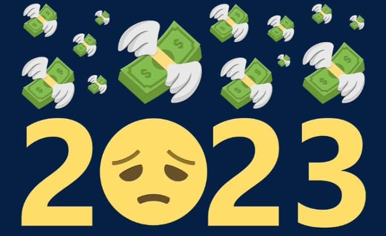 The image shows 2023 with a disappointed face emoji, money with wings, financial problems, and an economic crisis.