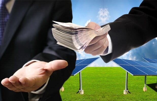 The image shows a person in a suit exchanging money